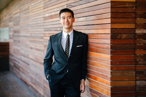 Men's Wearing Black Suit Jacket and Pants