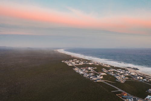 Aerial View of Beach during Sunset