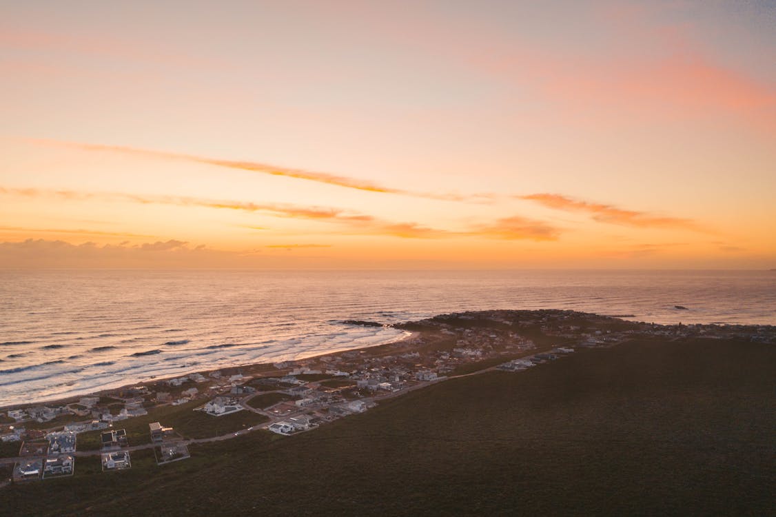 Aerial View of Beachfront Properties Along the Coastline