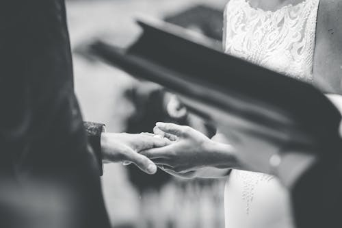 Groom and Bride Holding Hands