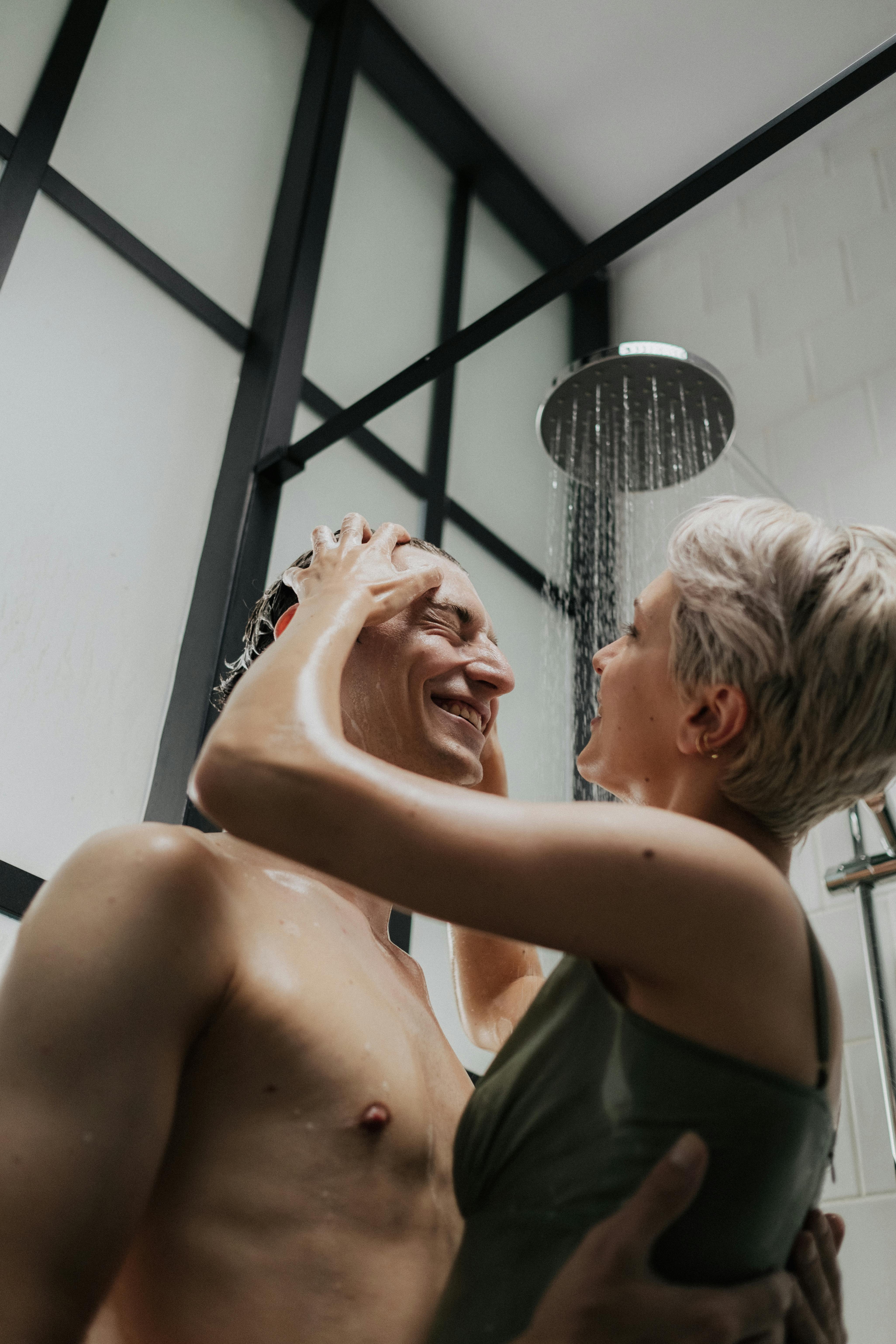 a romantic couple taking shower