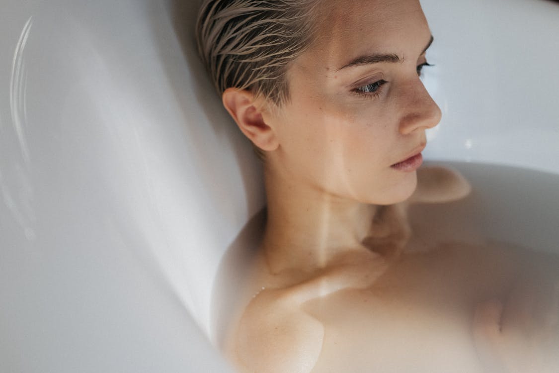 Woman in a Bathtub With Water