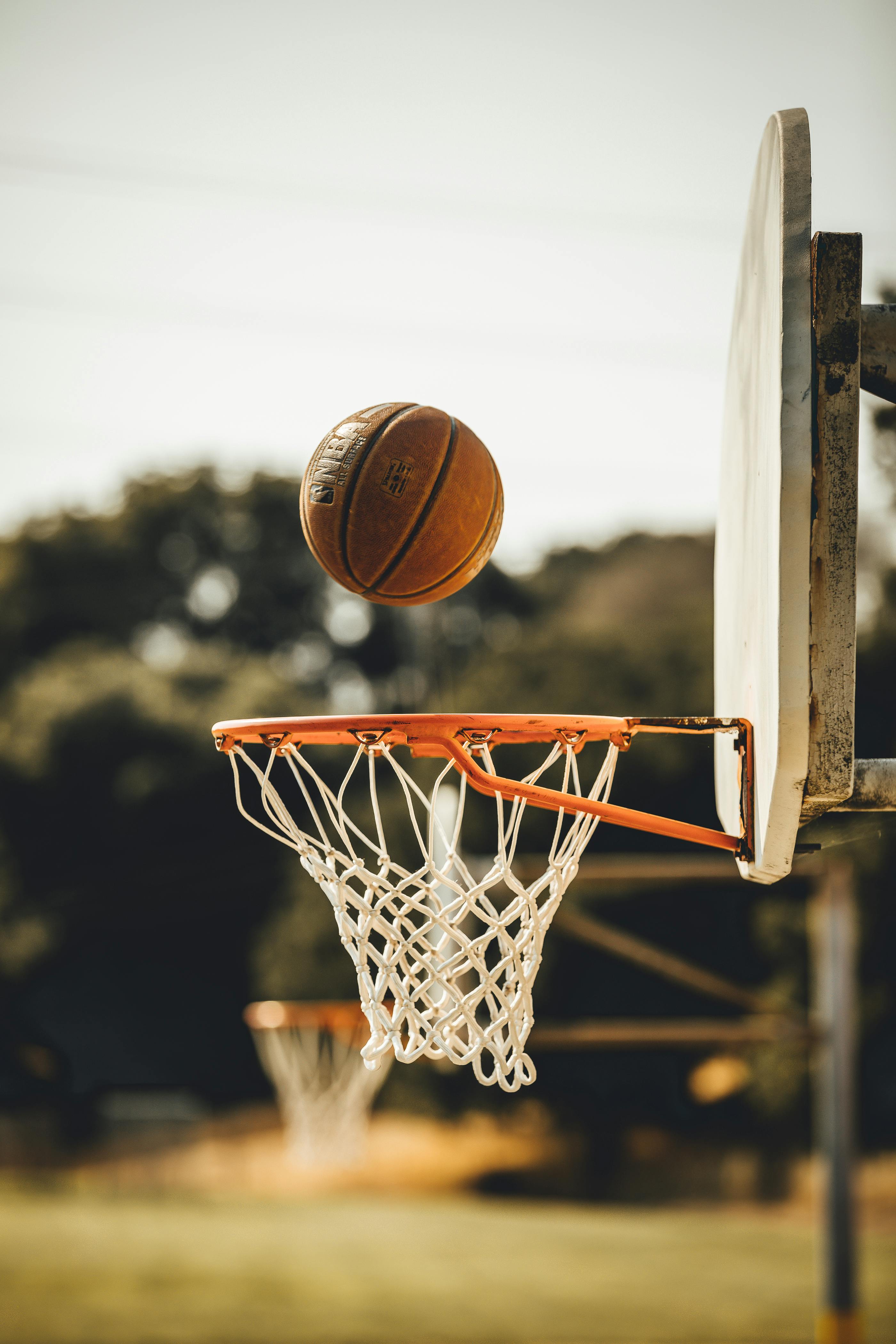 ball above a basketball ring