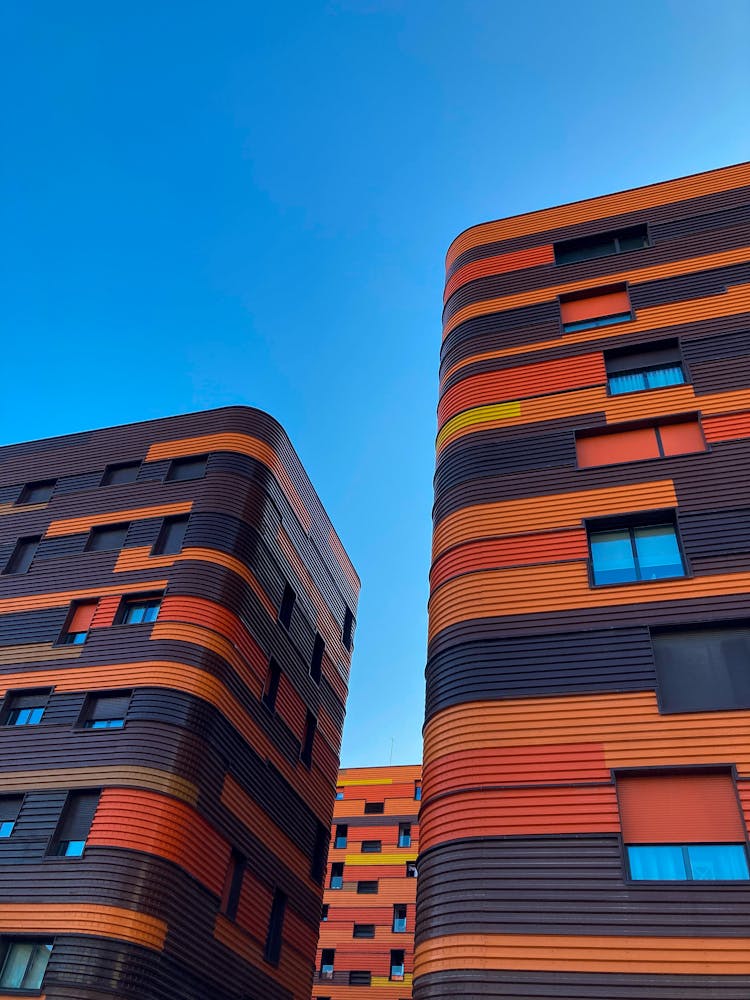 Colorful Apartment Buildings On Blue Sky