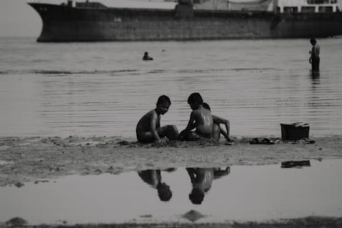 Boys Playing on the Beach