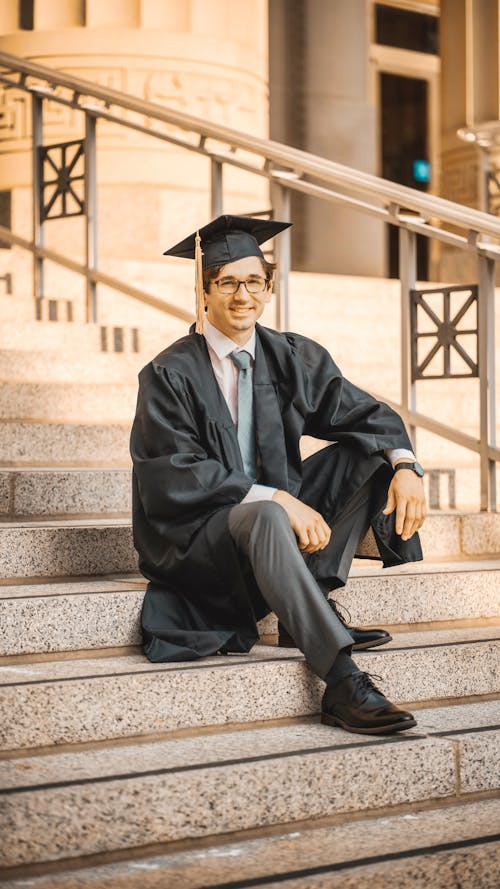 
A Graduate Sitting on the Stairs