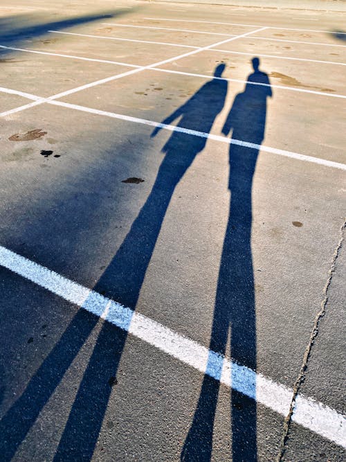 Shadows of People on Car Park