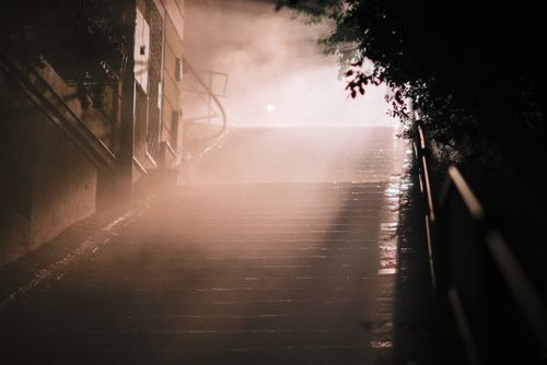 Free Mysterious foggy staircase scene captured in Budapest, Hungary during nighttime. Stock Photo