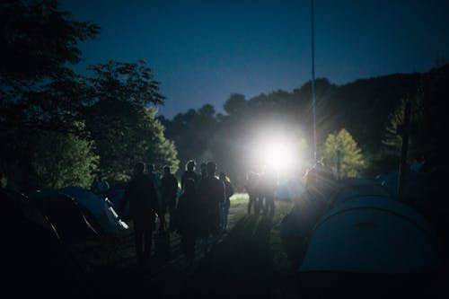 Free Campers on the Camp Site at Night Stock Photo