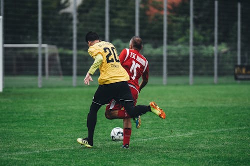 Men Playing Soccer 