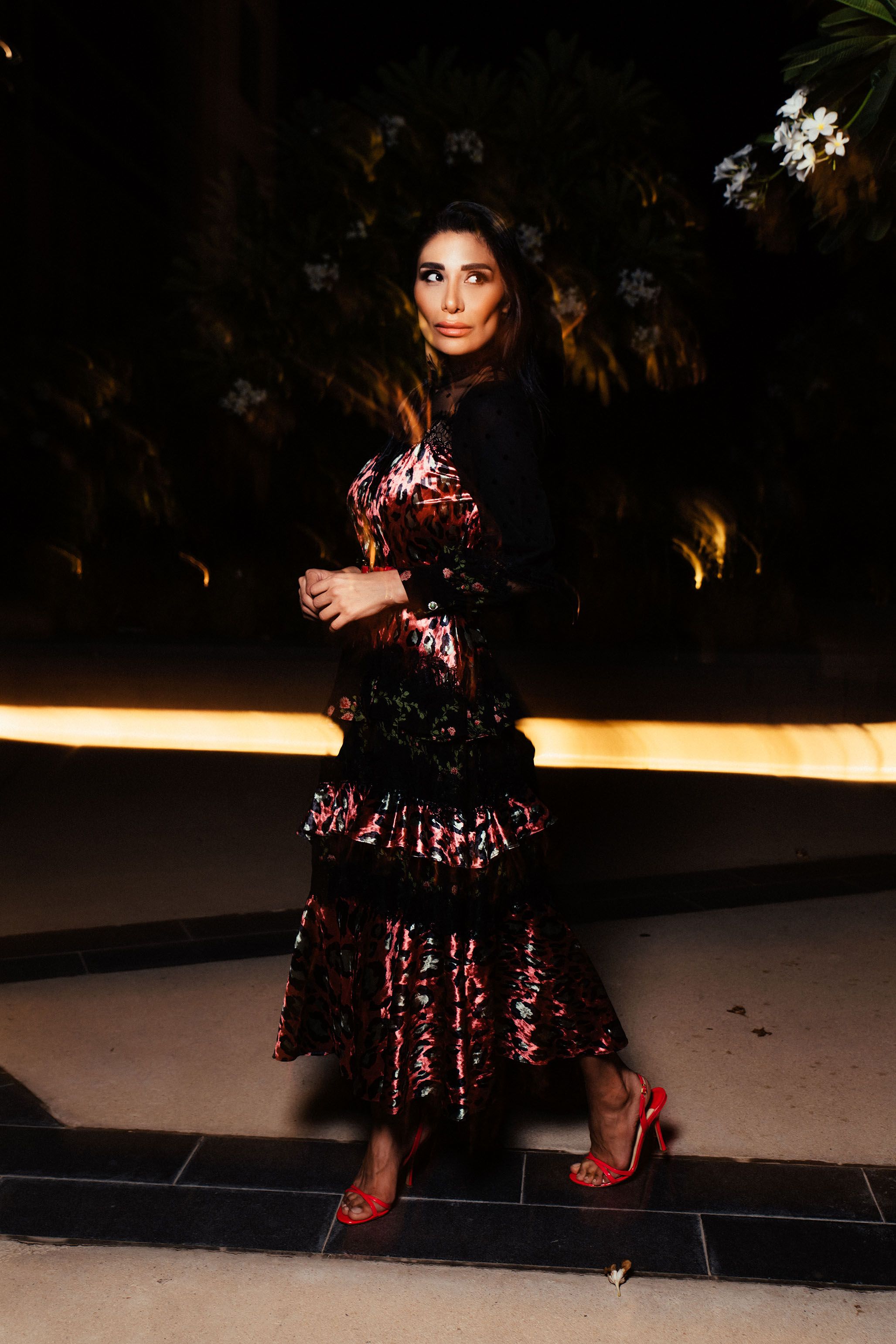 Woman in Black and Red Dress Wearing Red High Heel Shoes · Free Stock Photo