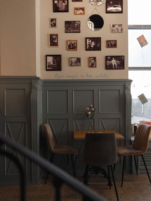 Warm and inviting café interior featuring vintage decor and rustic seating.