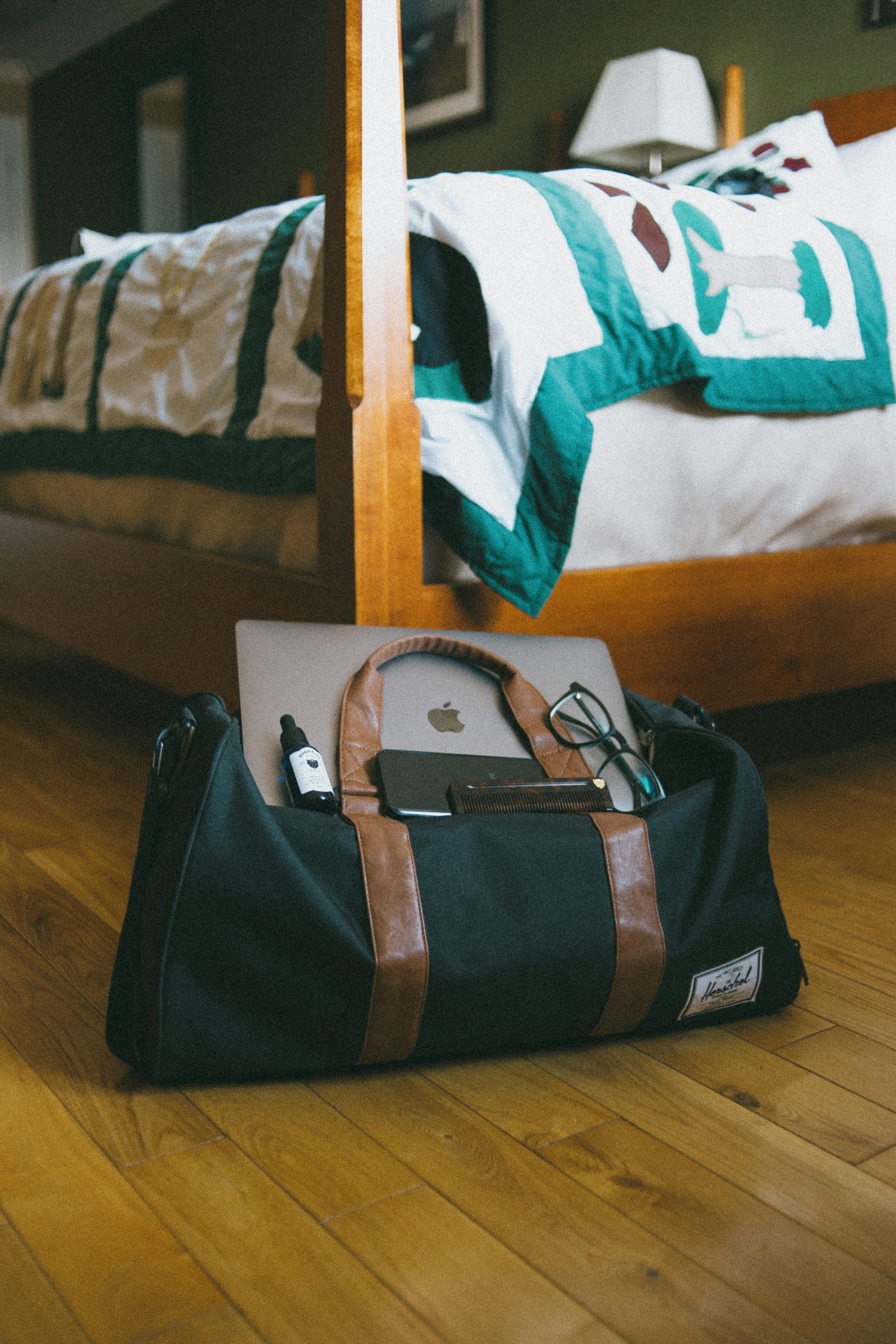 Laptop and Smartphone on a Bag · Free Stock Photo