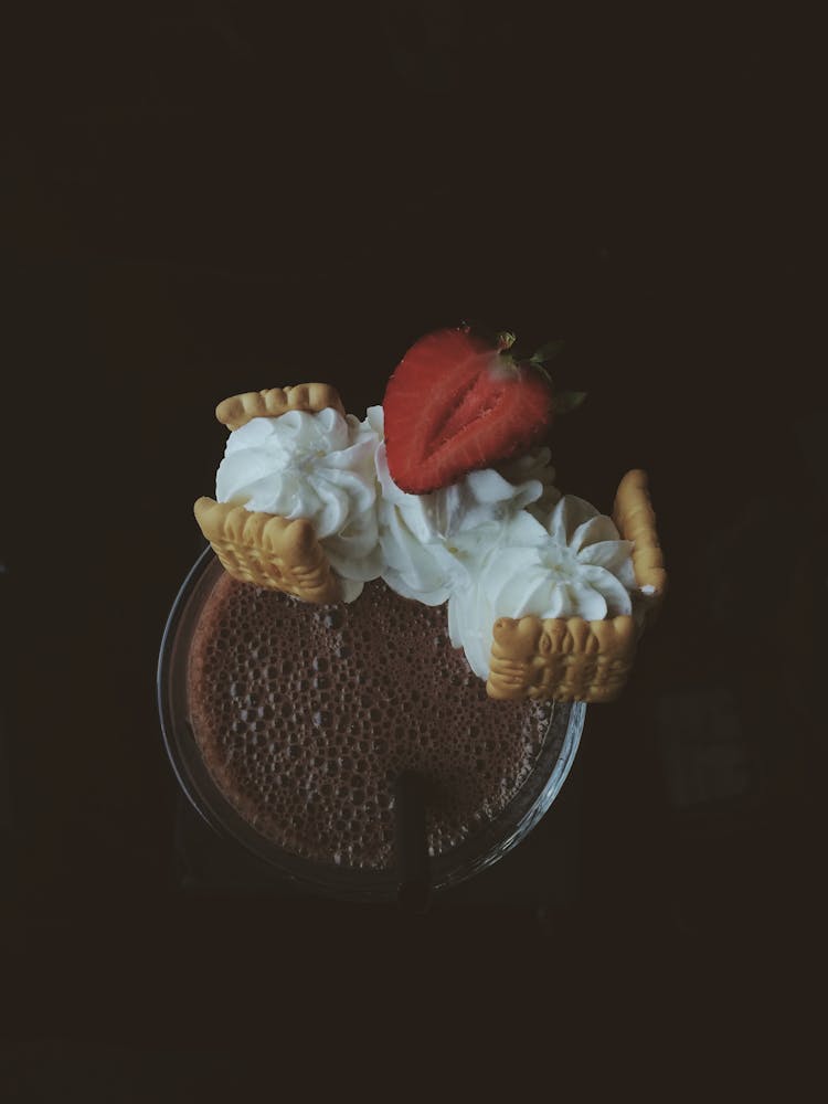 Whipped Cream With Biscuits And Strawberry On Glass With Chocolate Drink