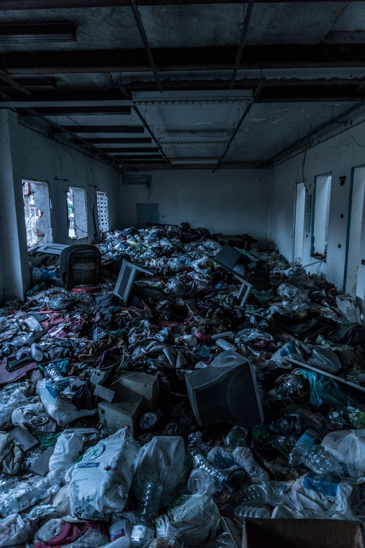 Cluttered room showing the type of heavy accumulation that may require professional hoarding cleanup