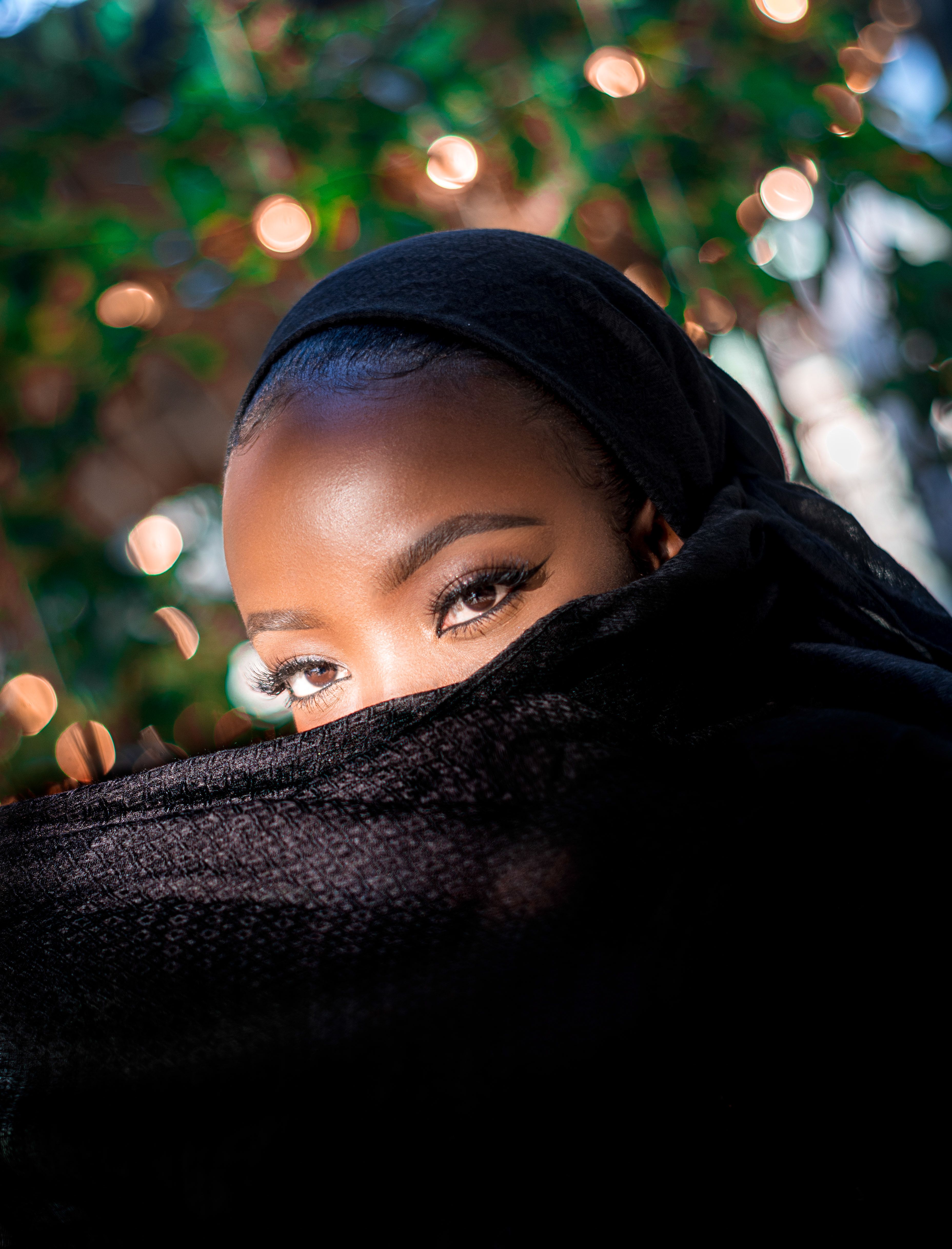 Woman in Black Hijab Covering Her Face · Free Stock Photo