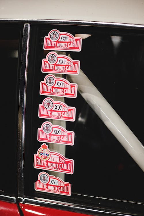 Close up of Stickers on a Car Window · Free Stock Photo