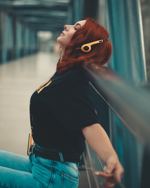 Woman Leaning on Railing