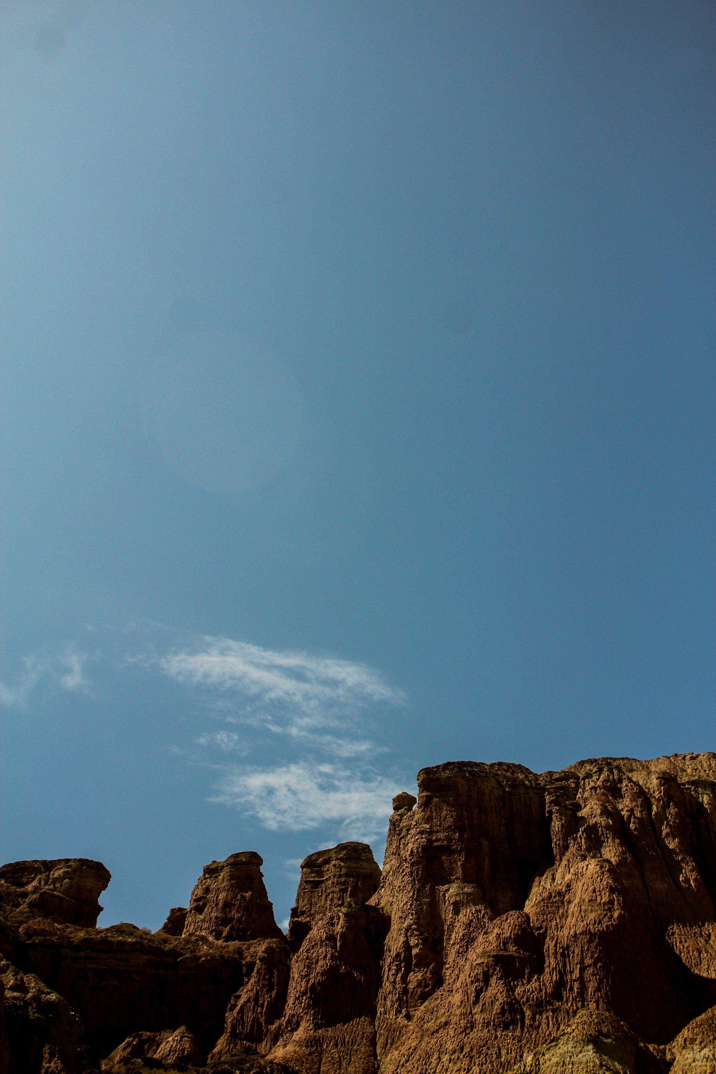 Brown Rocky Mountain Under Blue Sky · Free Stock Photo
