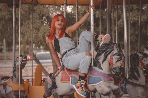 A Woman Riding a Carnival Ride