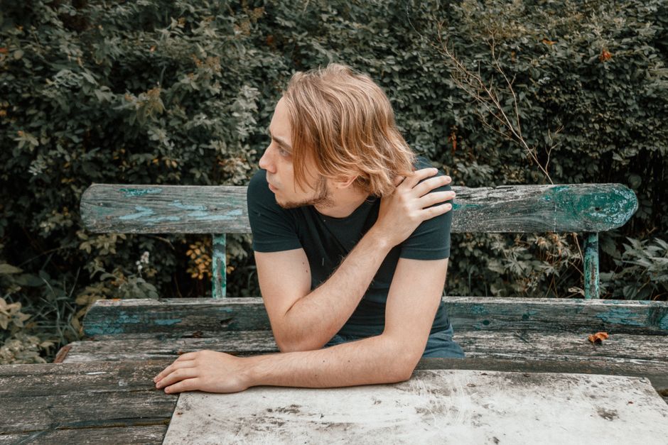 thoughtful person on bench