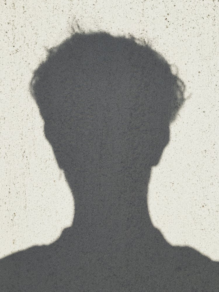 Shadow Of A Person's Head