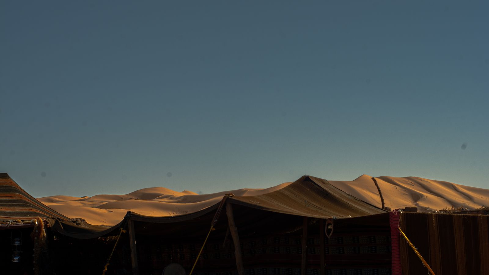 A tent and desert in the distance, Sudan