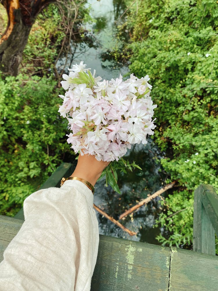 Hand Holding Bouquet