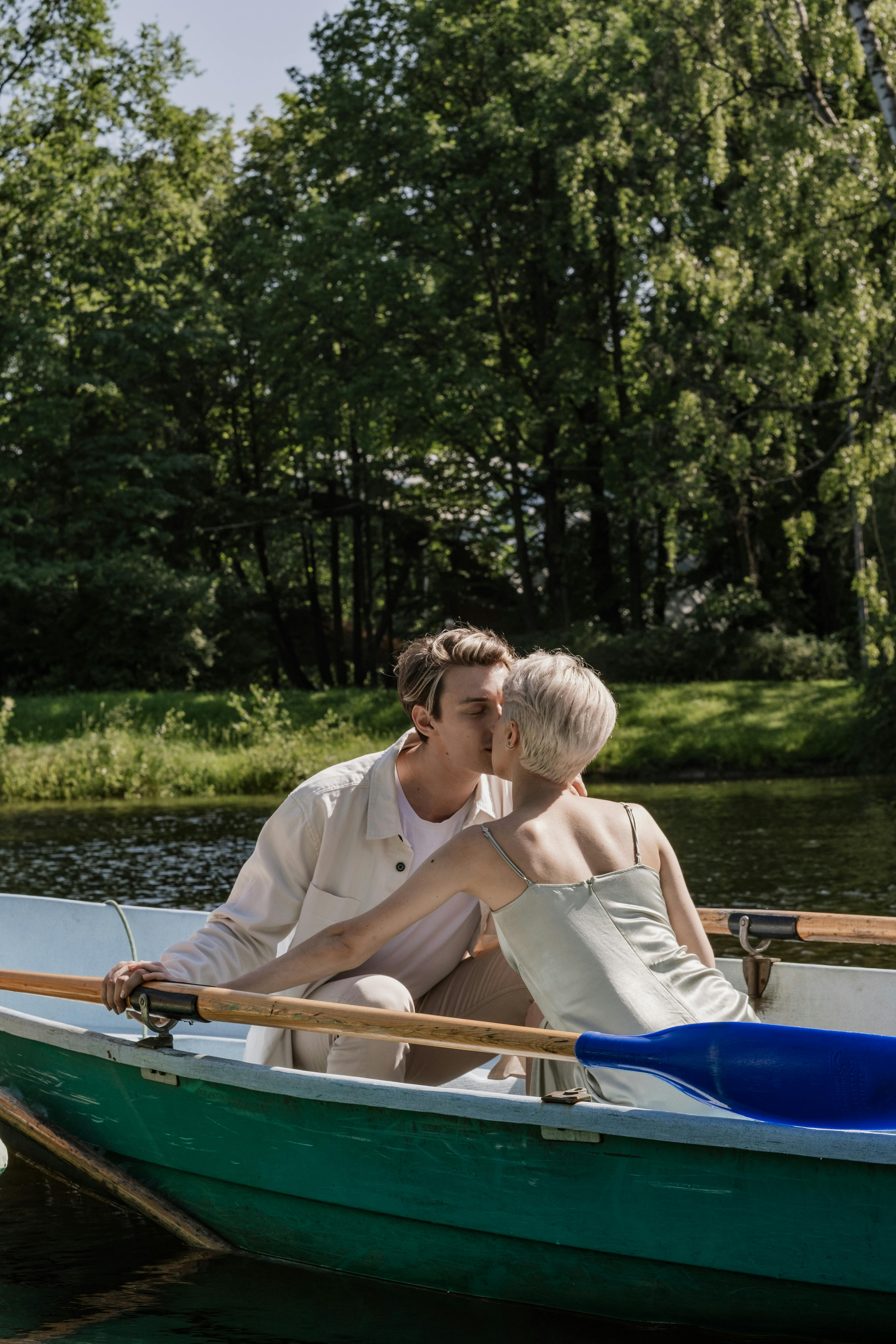 couple kissing on a boat