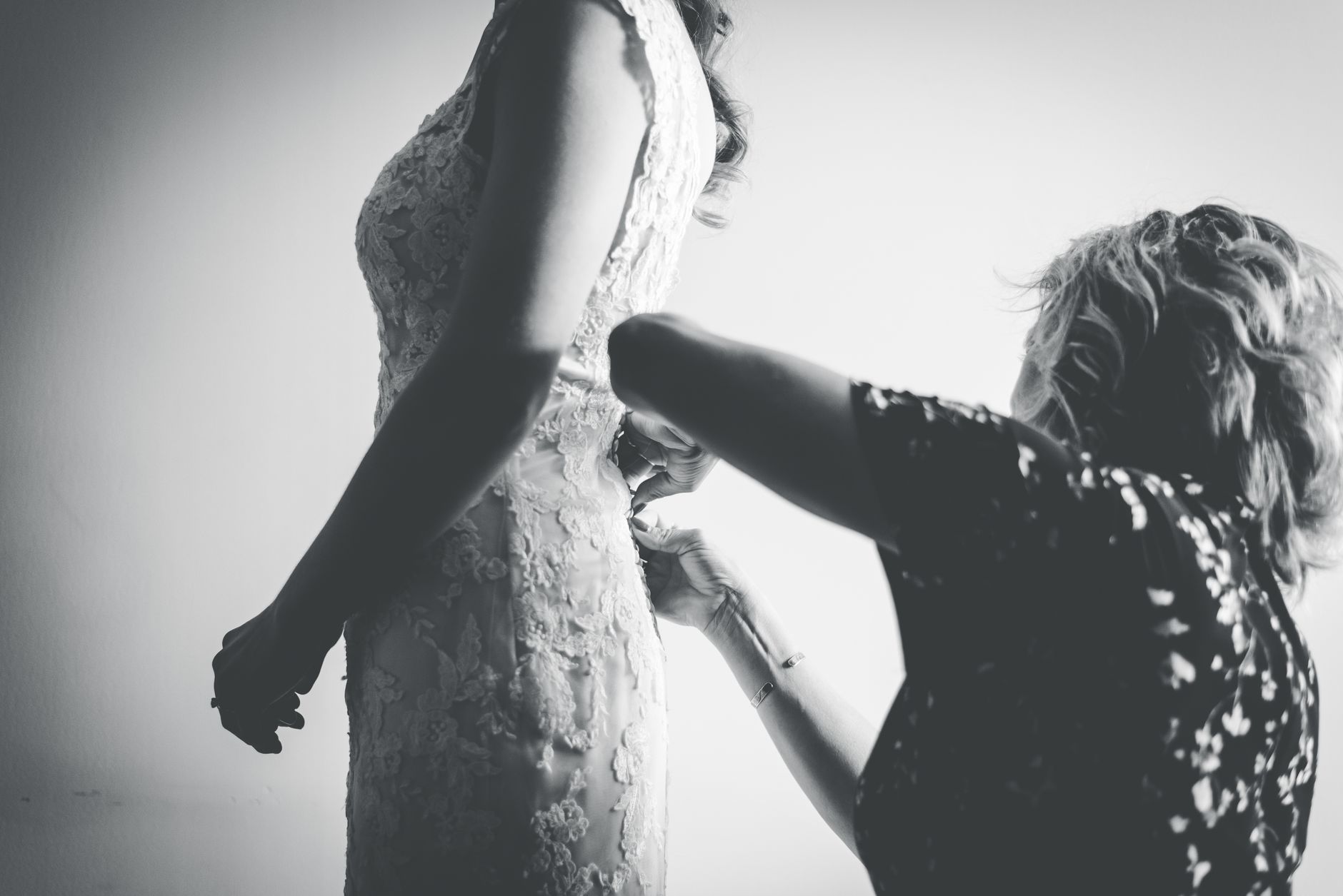 A bridal fitting captures the uncertainty of choosing a gown before a body has stopped changing
