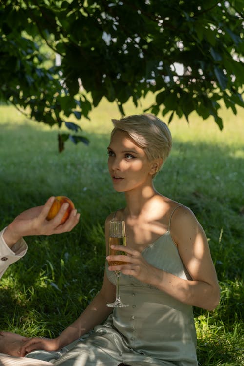 Blond Woman Holding Champagne Glass