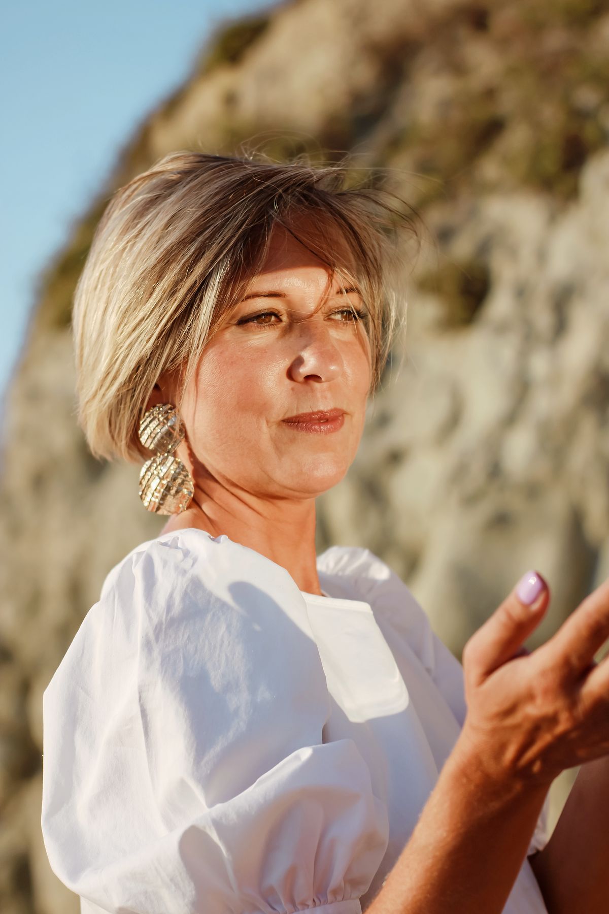 Confident midlife woman in warm natural light
