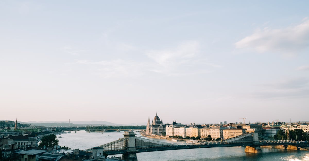 A picturesque view of Budapest featuring the Chain Bridge and Hungarian Parliament along the Danube River.