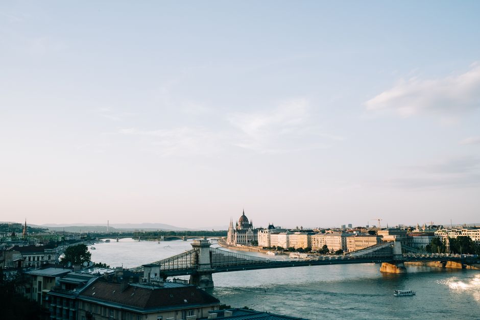 A picturesque view of Budapest featuring the Chain Bridge and Hungarian Parliament along the Danube River.