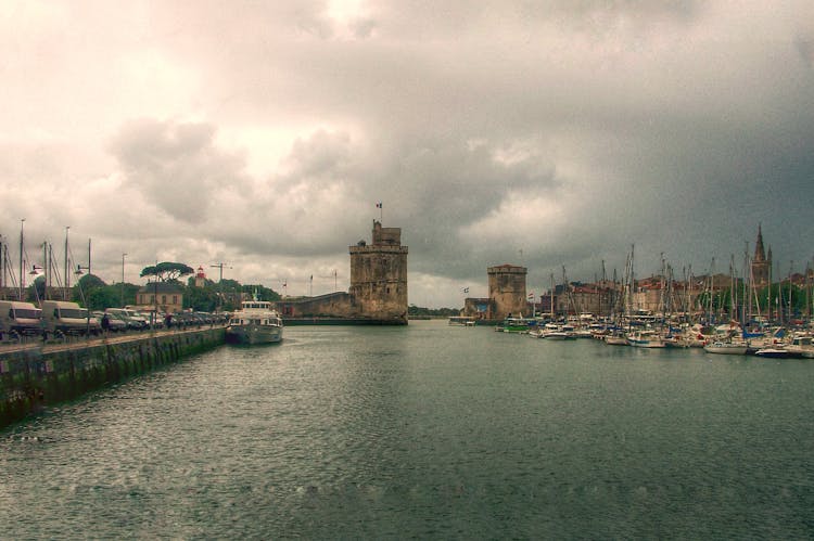 Watercrafts Docked Near St. Nicholas Tower In La Rochelle, France