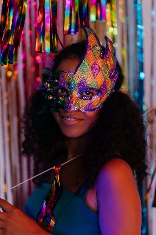 Portrait of a Man Wearing a Mask During a Party