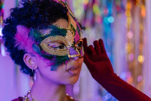 Woman Wearing a Mardi Gras Mask