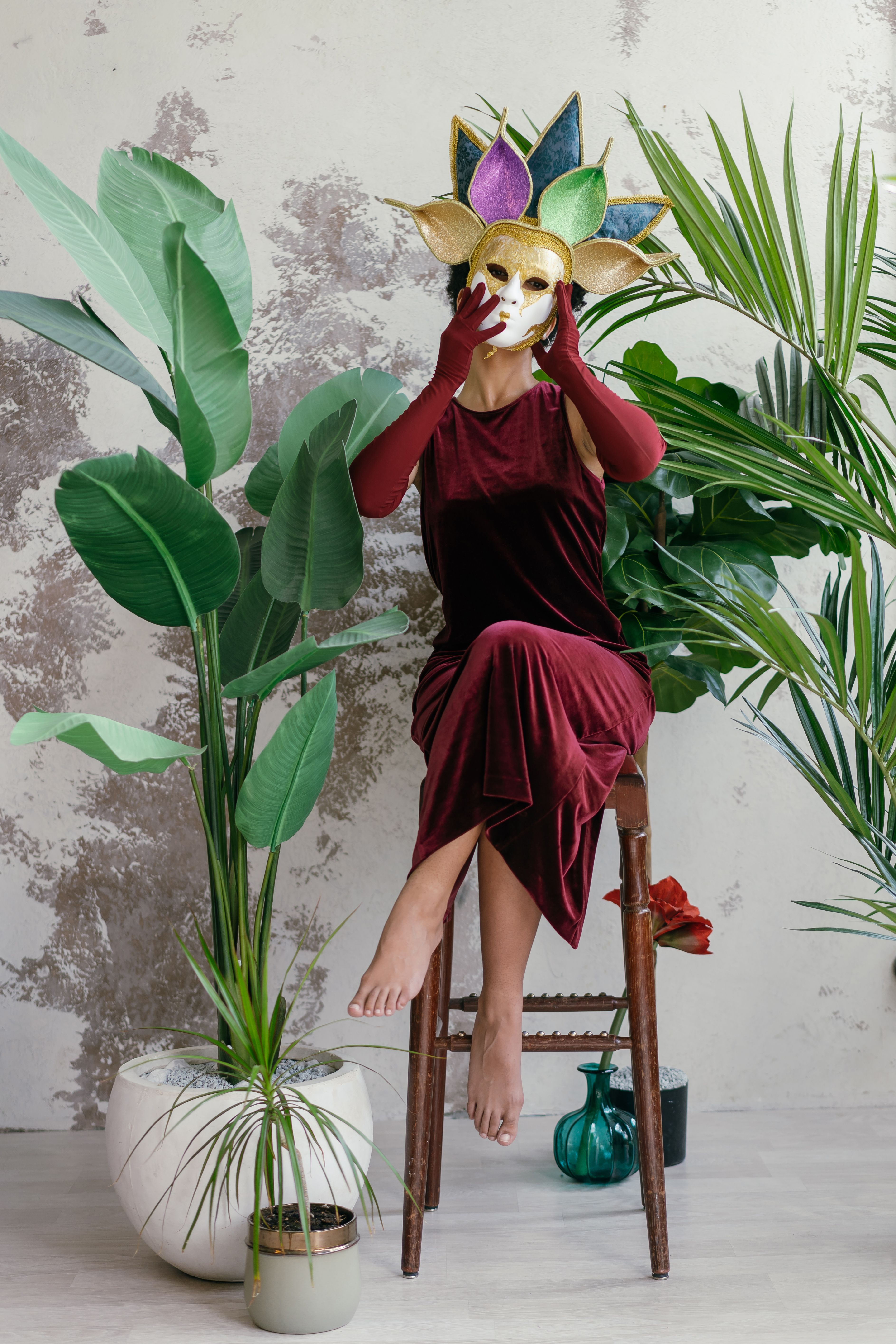 Woman in Red Dress Sitting on Brown Wooden Chair · Free Stock Photo