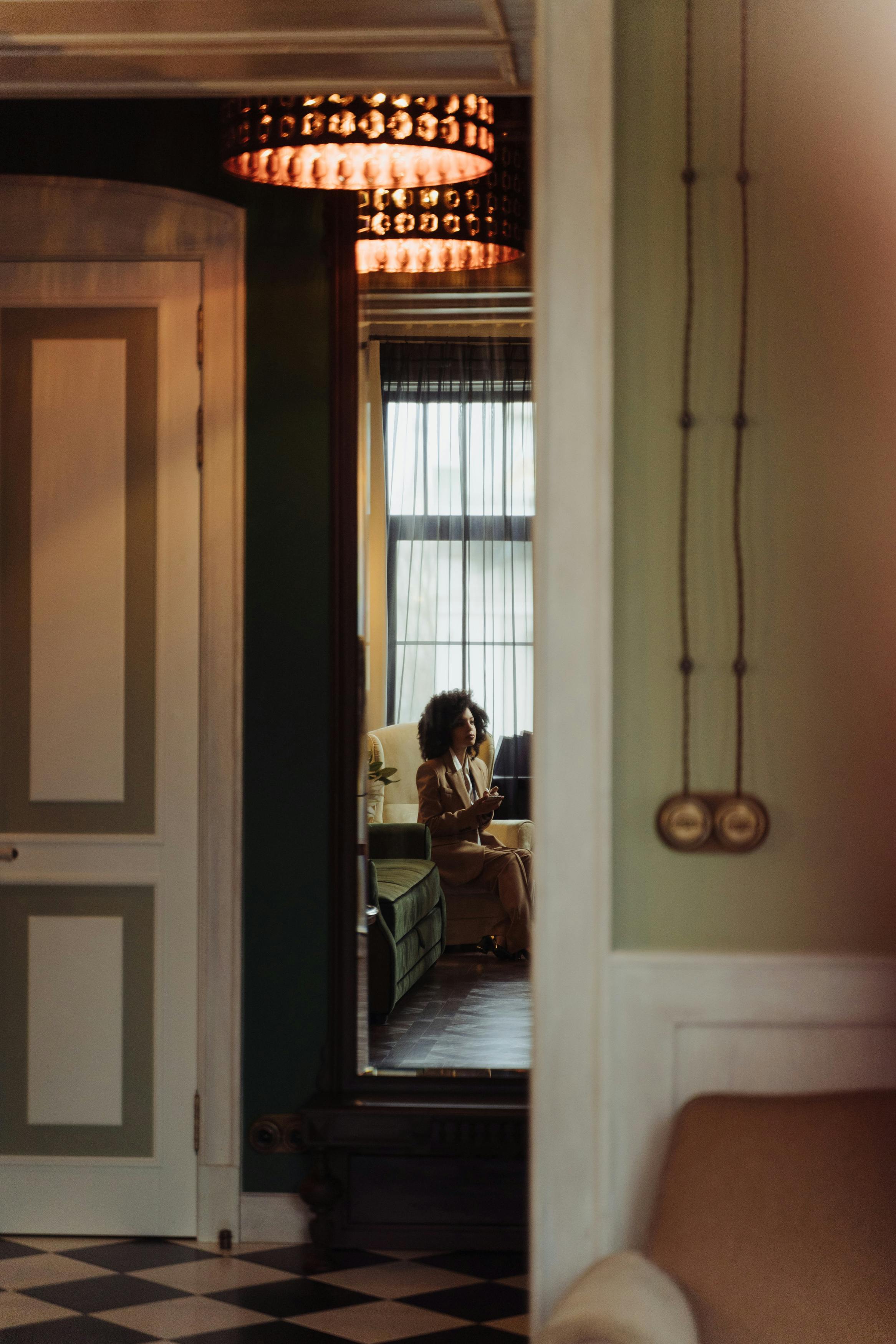 woman sitting alone in a room