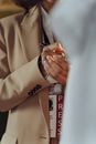 Man in Brown Suit Jacket Wearing Black Watch