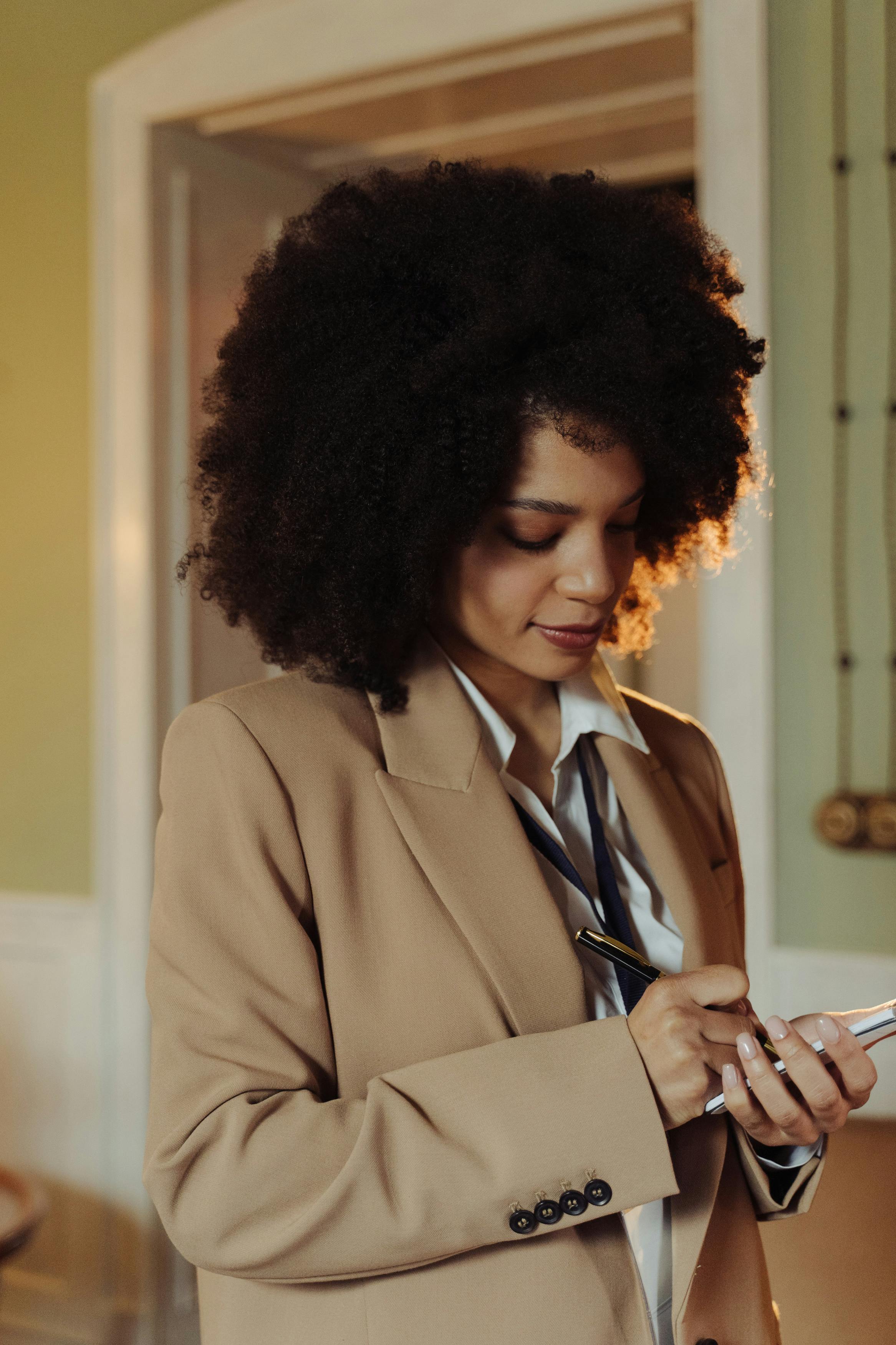 Two Woman in Black Sits on Chair Near Table · Free Stock Photo