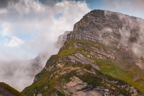 Free Mountain Peak Covered in Clouds Stock Photo