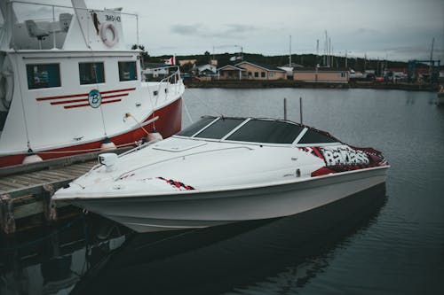 Photograph of a White and Red Motorboat