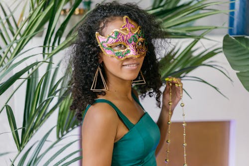 Woman with Curly Hair Wearing a Mask