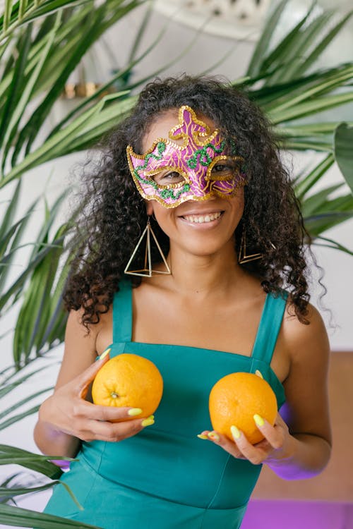 Free Woman Wearing Mask Holding Fruits Stock Photo