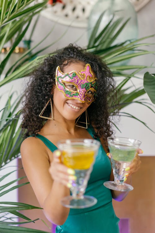 Woman Wearing Mask Holding Drinks