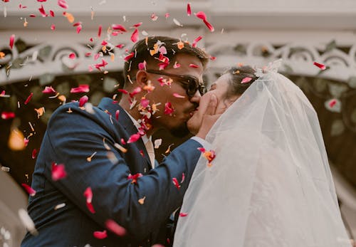Petals Falling on a Newlywed Couple