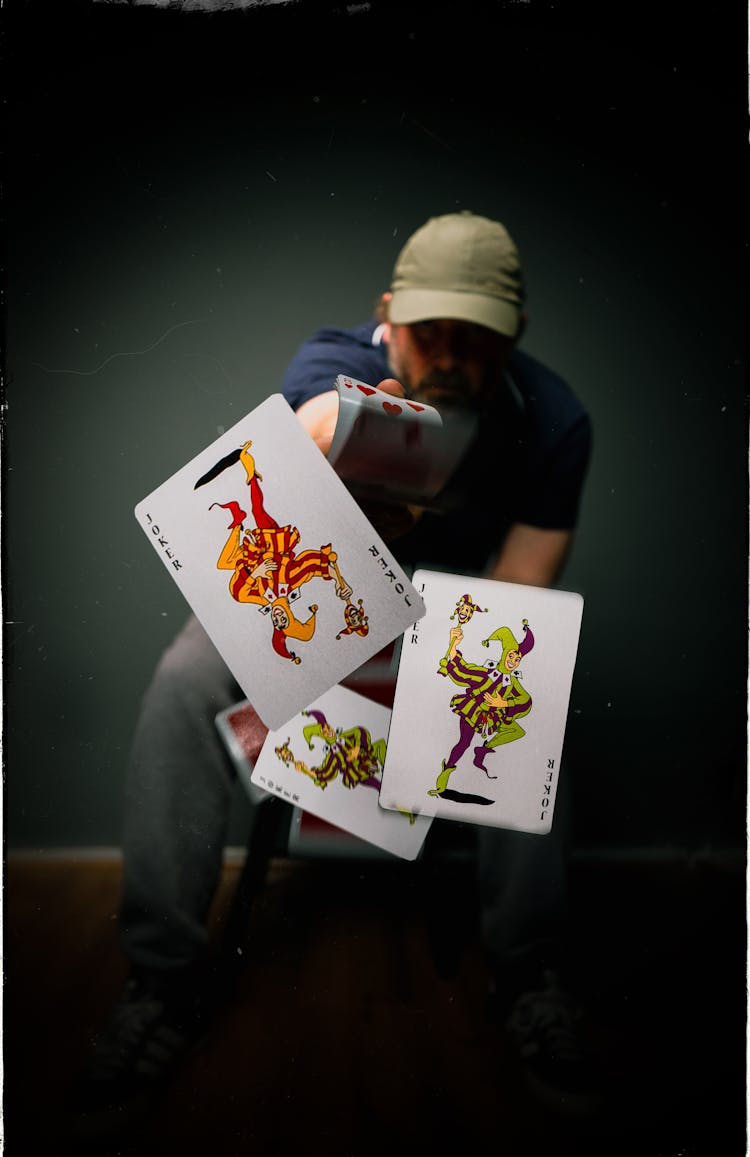 Man Flipping Playing Cards