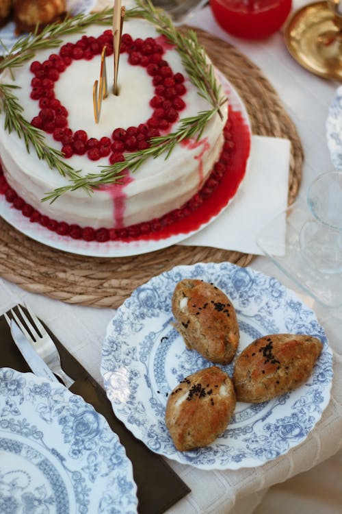 Red Berries and Rosemary Garnish on Cake
