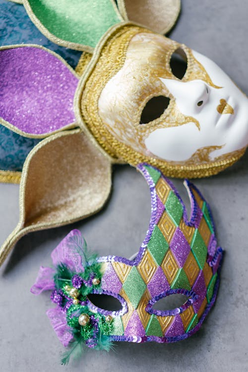 Masquerade Masks on Gray Surface